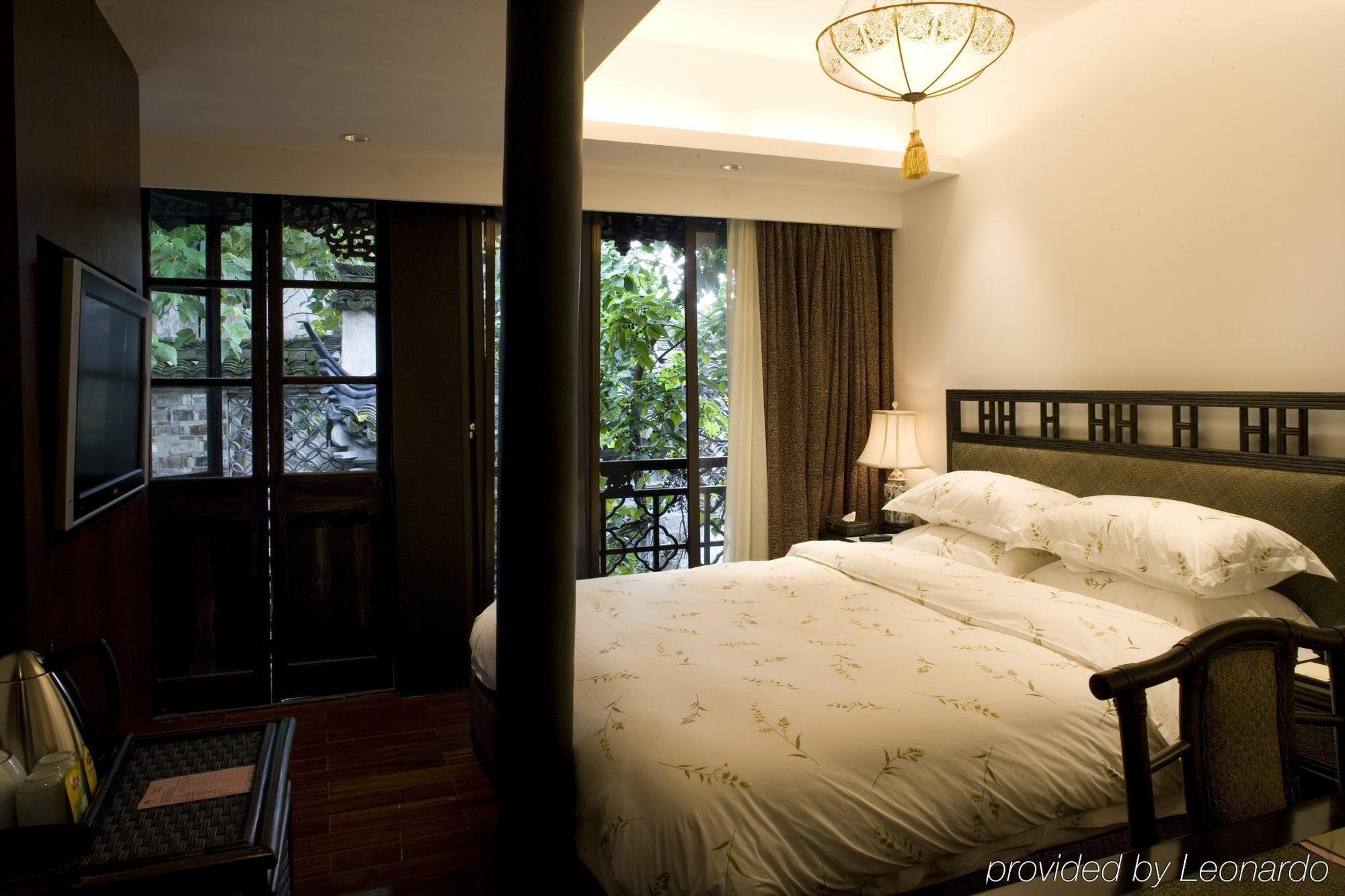 Готель Wuzhen Clubhouse Цзясін Номер фото