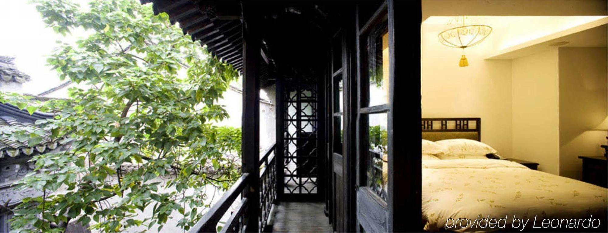 Готель Wuzhen Clubhouse Цзясін Номер фото